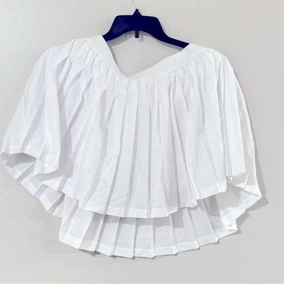 - ID Ideology Women S Active Solid Pleated Skort
Skirt, short White - Picture 7 of 9